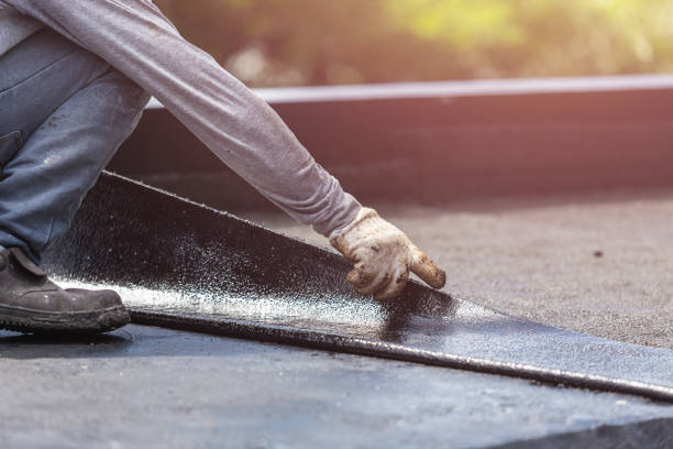 Professional Waterproofing technician working in Brownsville, IN